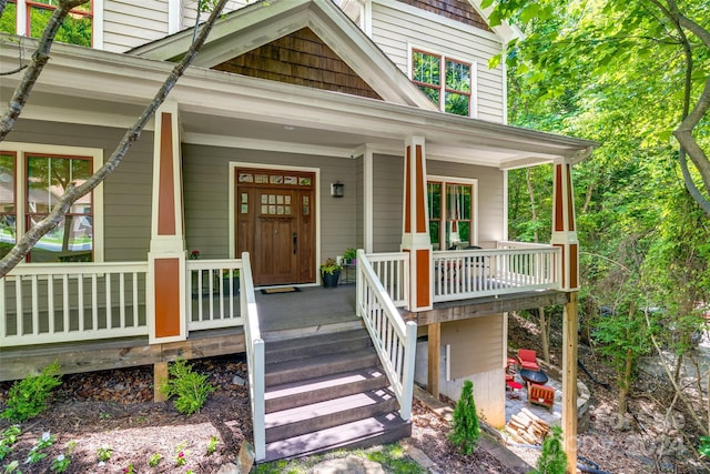 property entrance featuring covered porch