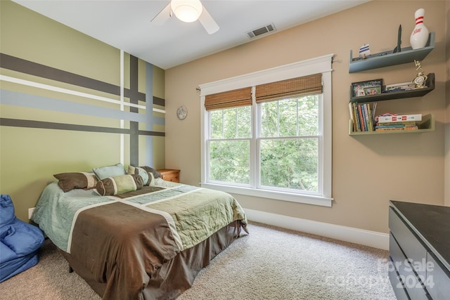 carpeted bedroom featuring ceiling fan