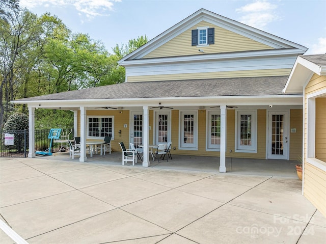 rear view of house featuring a patio area and ceiling fan