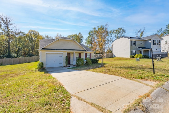 ranch-style home with a front yard and a garage