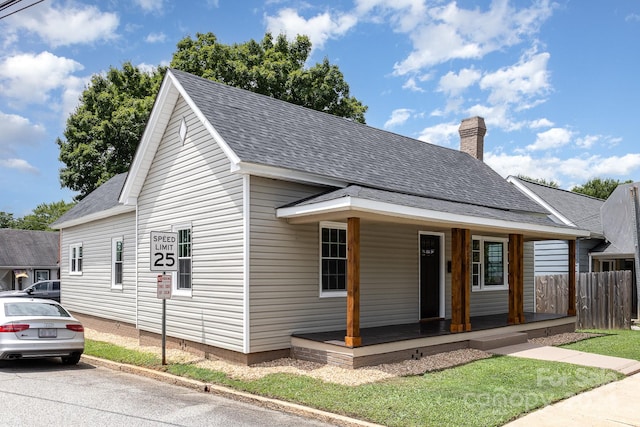 view of front of property featuring covered porch