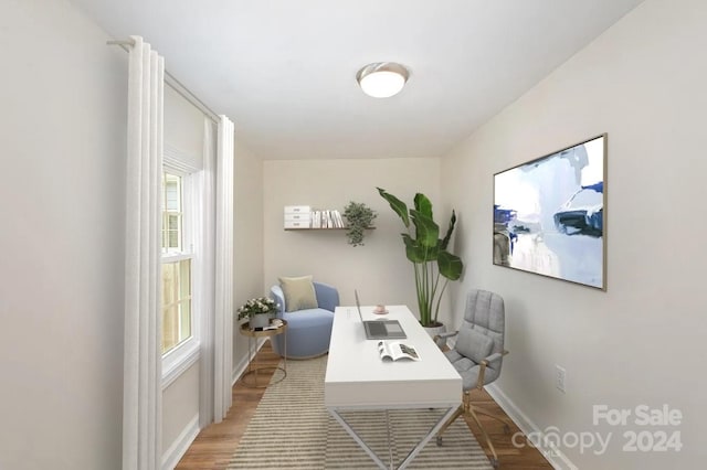 office with hardwood / wood-style flooring