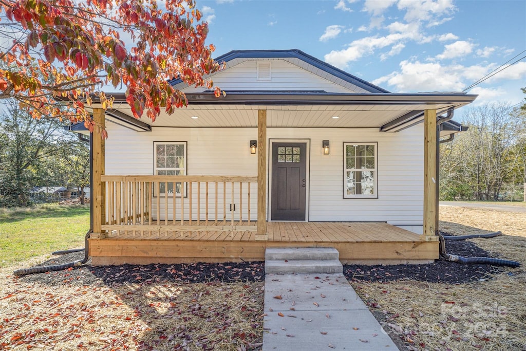 bungalow featuring covered porch