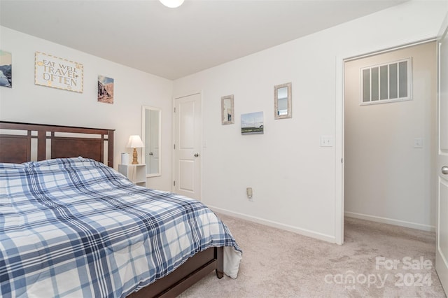 bedroom featuring carpet flooring, baseboards, and visible vents