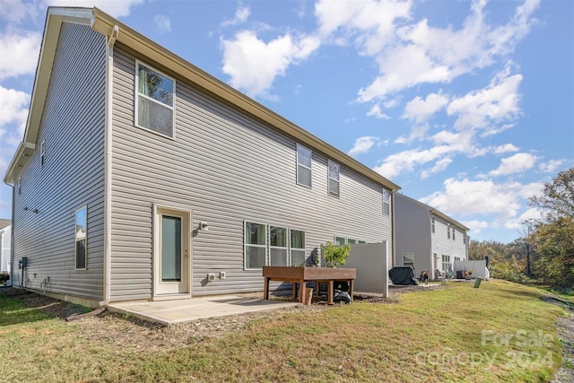 14034 Clayborn St Unit 28, Midland, NC 28107 - rear view of house with a yard and a patio area