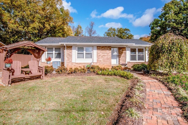 view of front of home featuring a front lawn