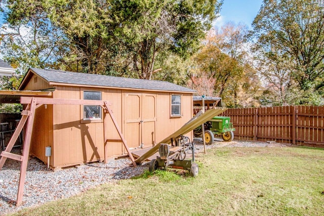 view of outdoor structure with a yard