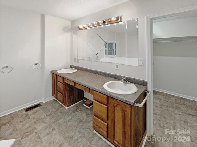 1259 Blacksnake Rd, Stanley, NC 28164 - full bath with double vanity and baseboards