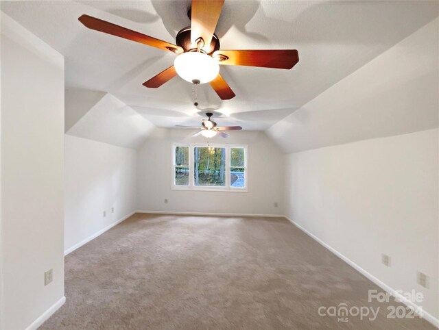 1259 Blacksnake Rd, Stanley, NC 28164 - additional living space featuring carpet, baseboards, lofted ceiling, and ceiling fan