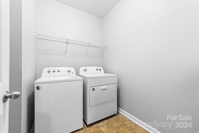 laundry room featuring washing machine and dryer