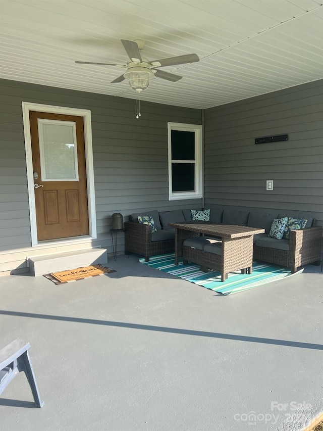 view of patio featuring an outdoor hangout area and ceiling fan