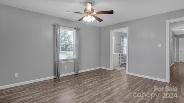 spare room featuring ceiling fan and wood-type flooring