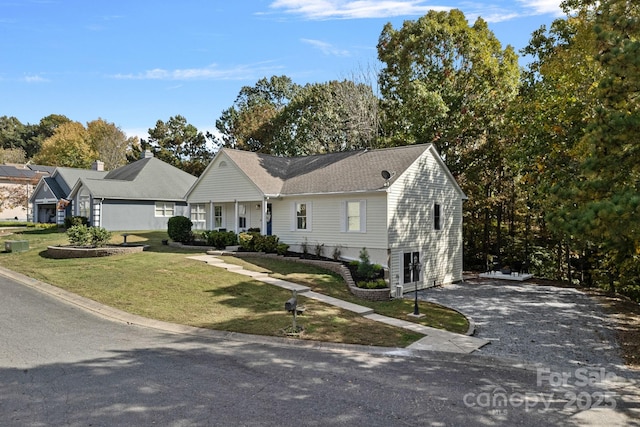 ranch-style home with a front yard