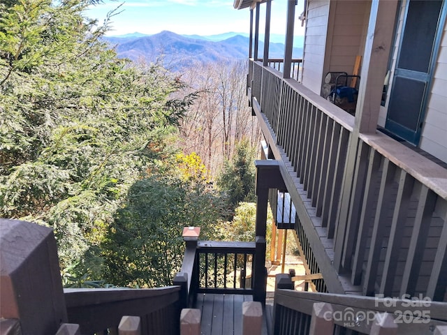 deck featuring a mountain view