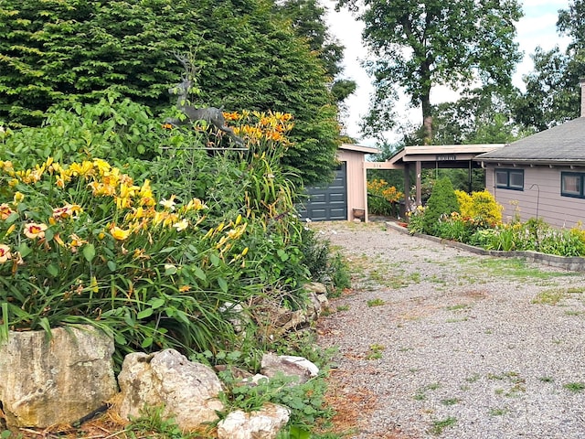 514 Skyridge Dr, Clyde, NC 28721 - view of yard with driveway, an outbuilding, and a garage