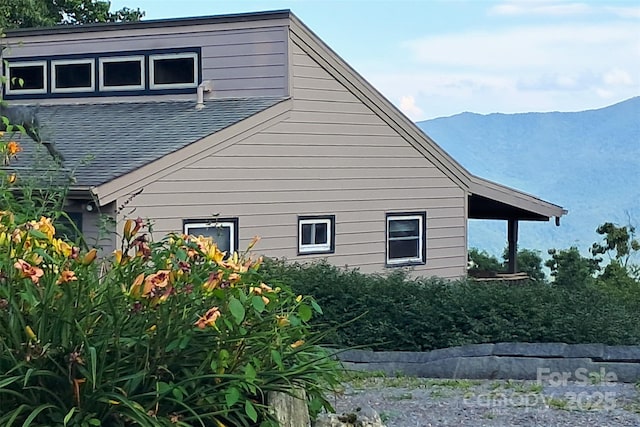 514 Skyridge Dr, Clyde, NC 28721 - view of side of home with roof with shingles and a mountain view