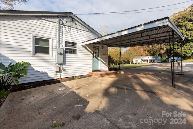 exterior space featuring concrete driveway