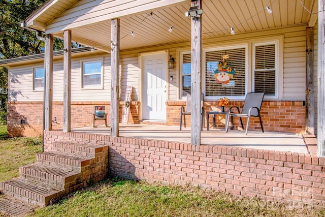 view of patio featuring a porch