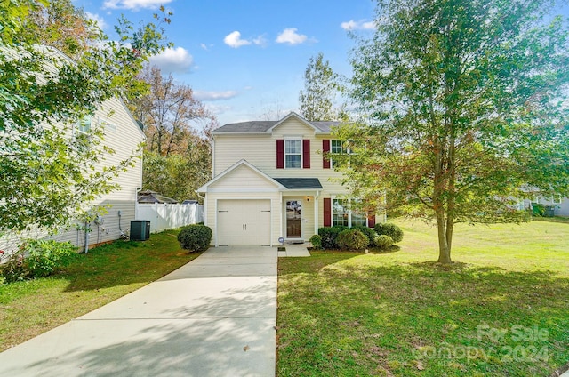 view of front of property featuring central air condition unit, a front lawn, and a garage