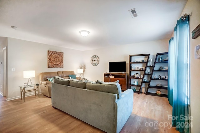 living room with light wood-type flooring