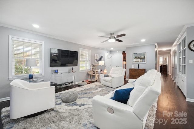 living room featuring crown molding, ceiling fan, and dark hardwood / wood-style floors