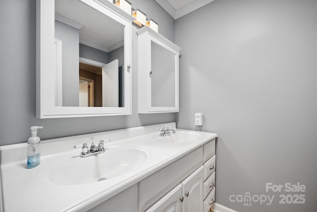 bathroom with vanity and ornamental molding