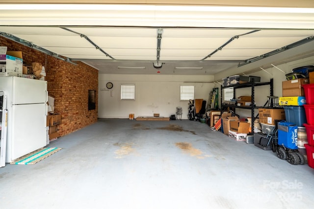 garage with white fridge