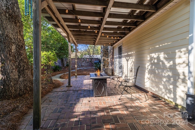 view of patio / terrace featuring a fire pit