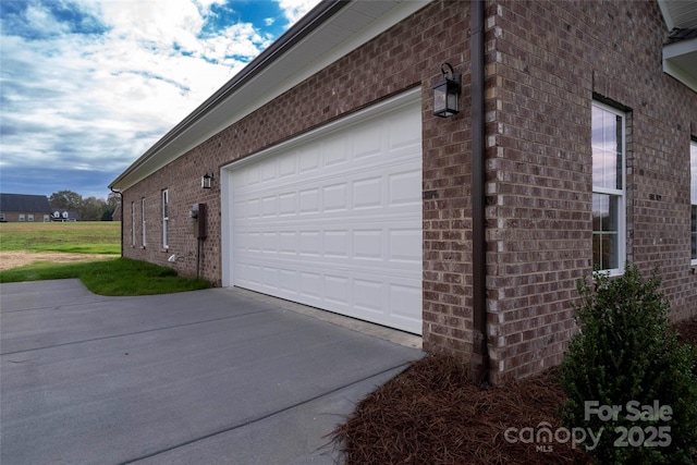 garage featuring driveway