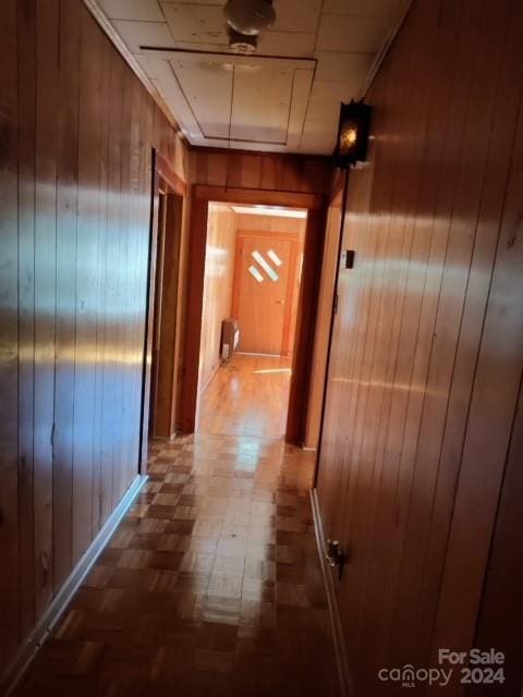 hallway with wooden walls