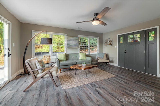 interior space with ceiling fan and hardwood / wood-style flooring