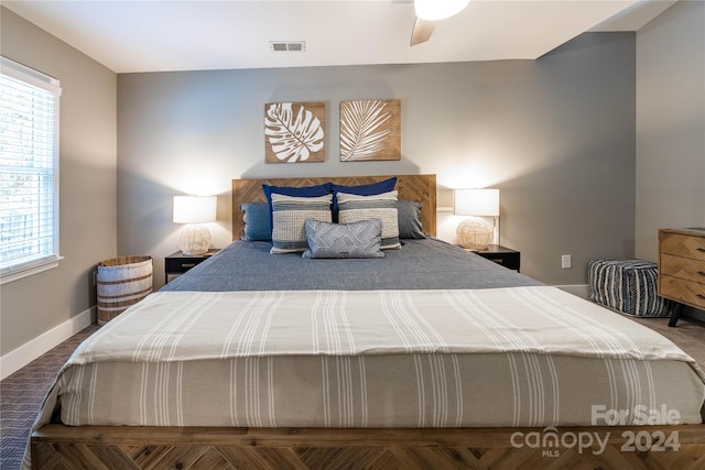 carpeted bedroom with ceiling fan