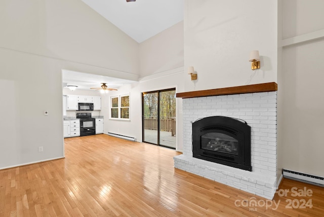 unfurnished living room featuring a fireplace, high vaulted ceiling, a baseboard radiator, and light hardwood / wood-style floors