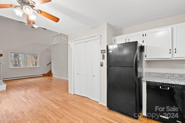 kitchen with black appliances, light hardwood / wood-style floors, white cabinetry, and baseboard heating