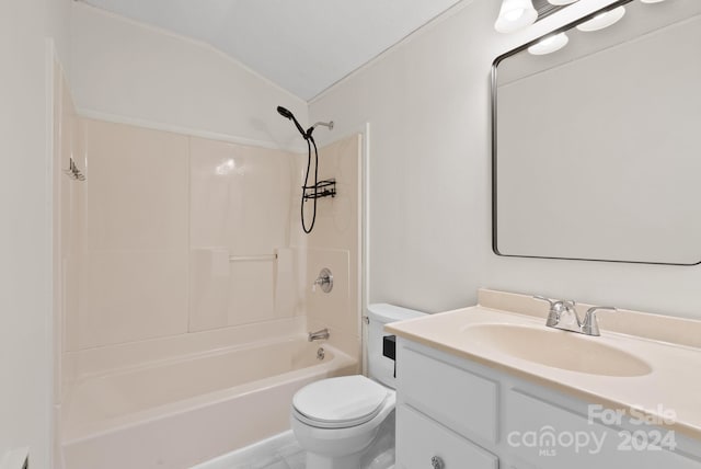 full bathroom with toilet, vanity, vaulted ceiling, and tub / shower combination