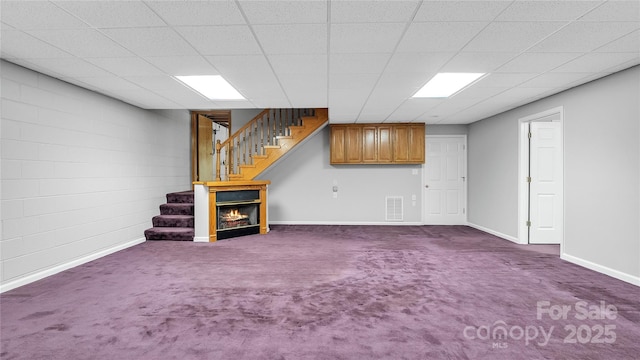 unfurnished living room featuring carpet flooring