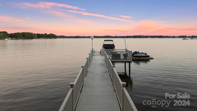 view of dock with a water view