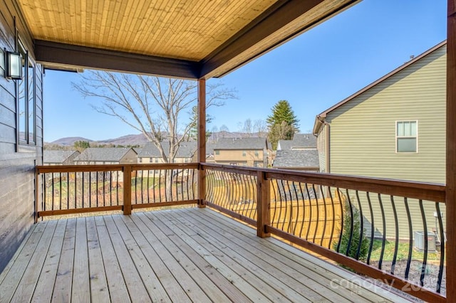 wooden terrace featuring a mountain view