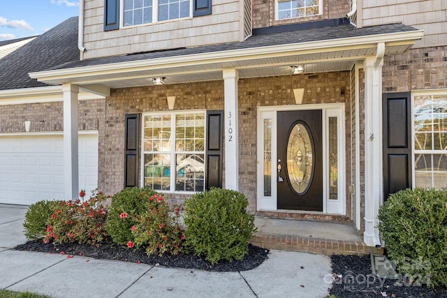 property entrance featuring a garage