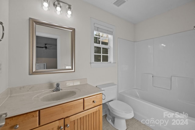 full bathroom with bathtub / shower combination, vanity, ceiling fan, tile patterned flooring, and toilet