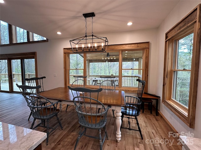 371 Hews Cir, Blowing Rock, NC 28605 - dining space featuring light wood-style flooring, plenty of natural light, recessed lighting, a chandelier, and baseboards