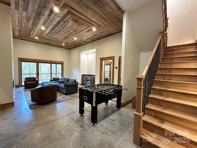 371 Hews Cir, Blowing Rock, NC 28605 - rec room featuring finished concrete floors, wood ceiling, recessed lighting, and baseboards