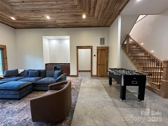 371 Hews Cir, Blowing Rock, NC 28605 - recreation room featuring wood ceiling, bar with sink, concrete flooring, baseboards, and recessed lighting
