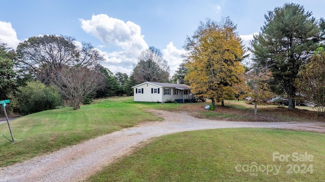 view of front of house with a front lawn