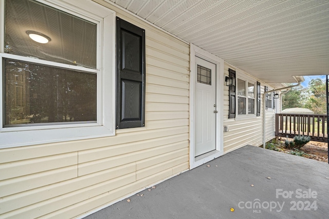 entrance to property with a porch