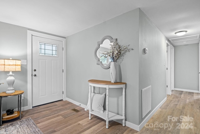 entryway with light hardwood / wood-style flooring