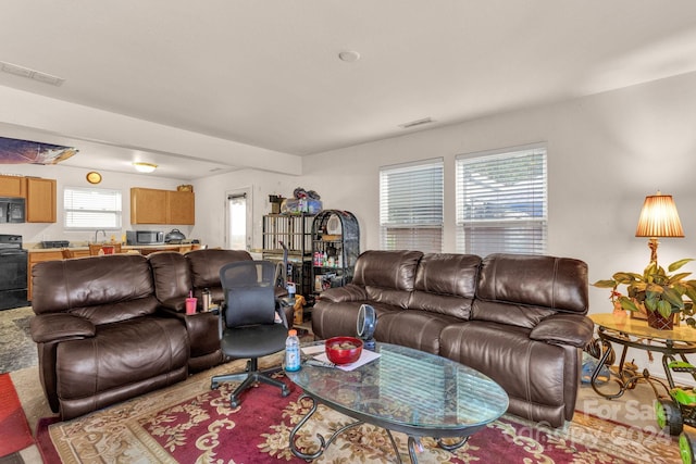 living room with light colored carpet