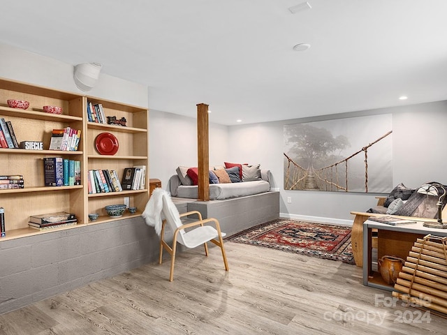 sitting room featuring light hardwood / wood-style floors