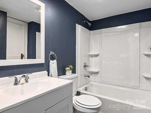 full bathroom with vanity, shower / bathtub combination, and toilet