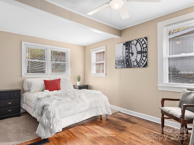 60 Fulton St, Asheville, NC 28801 - bedroom with wood finished floors, baseboards, crown molding, and a ceiling fan